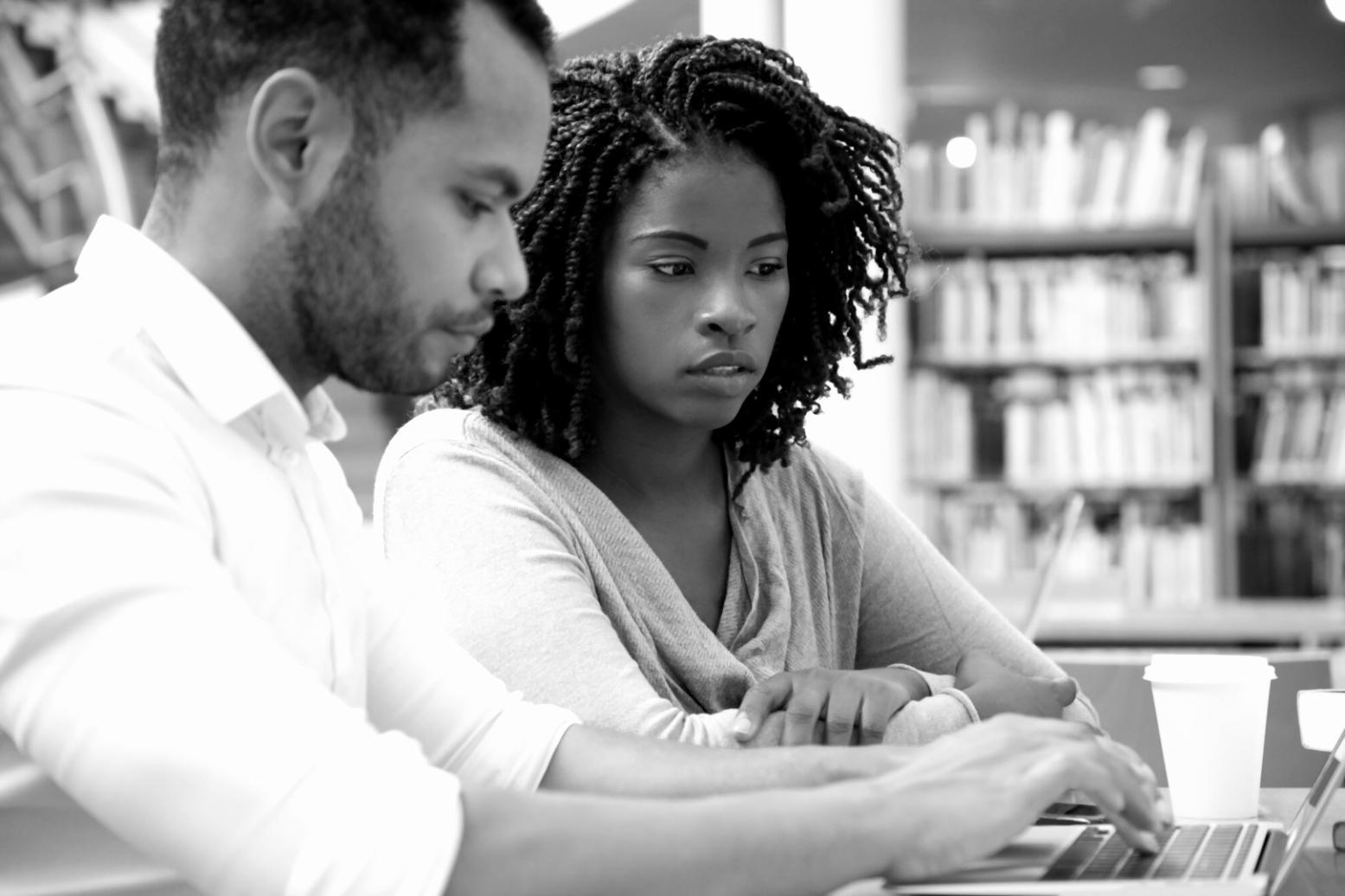 Tax professionals collaborating in modern learning environment